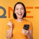 girl with phone qnet registration